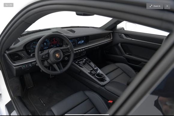 Actual 992.2 example - base interior, base wheel, no SC, base 4 ways (many examples in Porsche Europe site).  Wet, Normal, Sport drive mode selector on wheel as std.