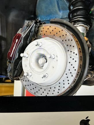 Anyone ever seen a painted wheel hub on a 993?  Why would this ne done?  