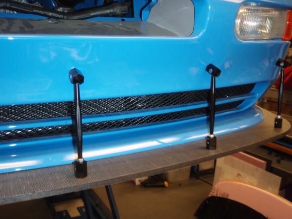 The supports are Longacre pieces, with one of their large washers inside the front cover.