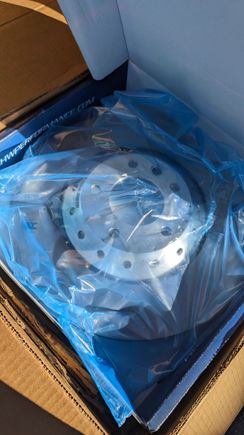 Shiny fresh brand new front rotors. I never knew our front rotors were a two-piece design (something other vehicles "upgrade" to when they do a BBK or something). Nice to have!