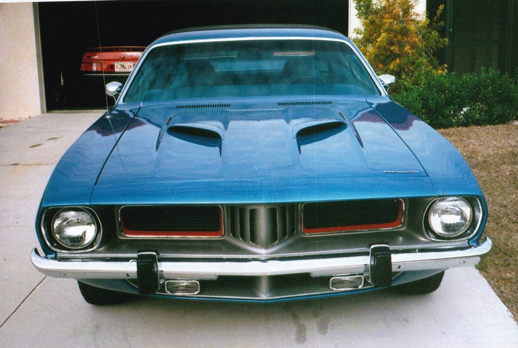 1974 'Cuda with 360 4 bbl. Fun car to drive and show.