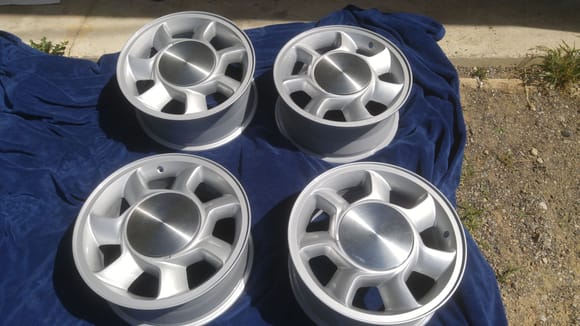 I also have a set of these original wheels and caps recently refinished in the factory for paint code, and all of the 4 lug stuff to including rear and front calipers and rotors axles and spindles that i have to sell unfortunately due to health problems