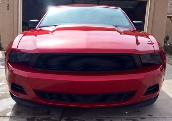 Removed the headlight covers, tinted the headlights, plasti dipped the billet grille and the surround