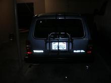 Volvo lettering covered with freeway grade reflective tape
used to work with a traffic control company that had these silver reflective tape rolls....it looks cool for the person behind me...Oh yeah, volvo in your face~~~~!