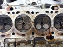 Head just came off.  Looking for issues.  See marks where valve hit cylinder.