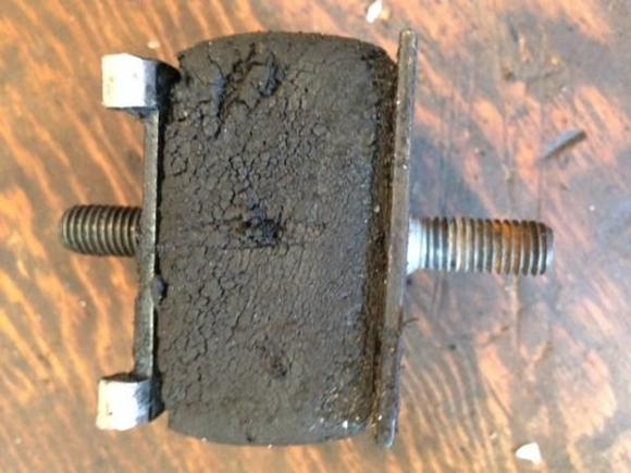 Transmission Mount looks super old.  Maybe original?  I found it very difficult to replace the mount when lining up the cross member. Had local Volvo mechanic come out and install it for me.  He used a punch for leverage in one of the bolt holes.  Installed!