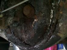 Rear axle housing cover rust hole repair