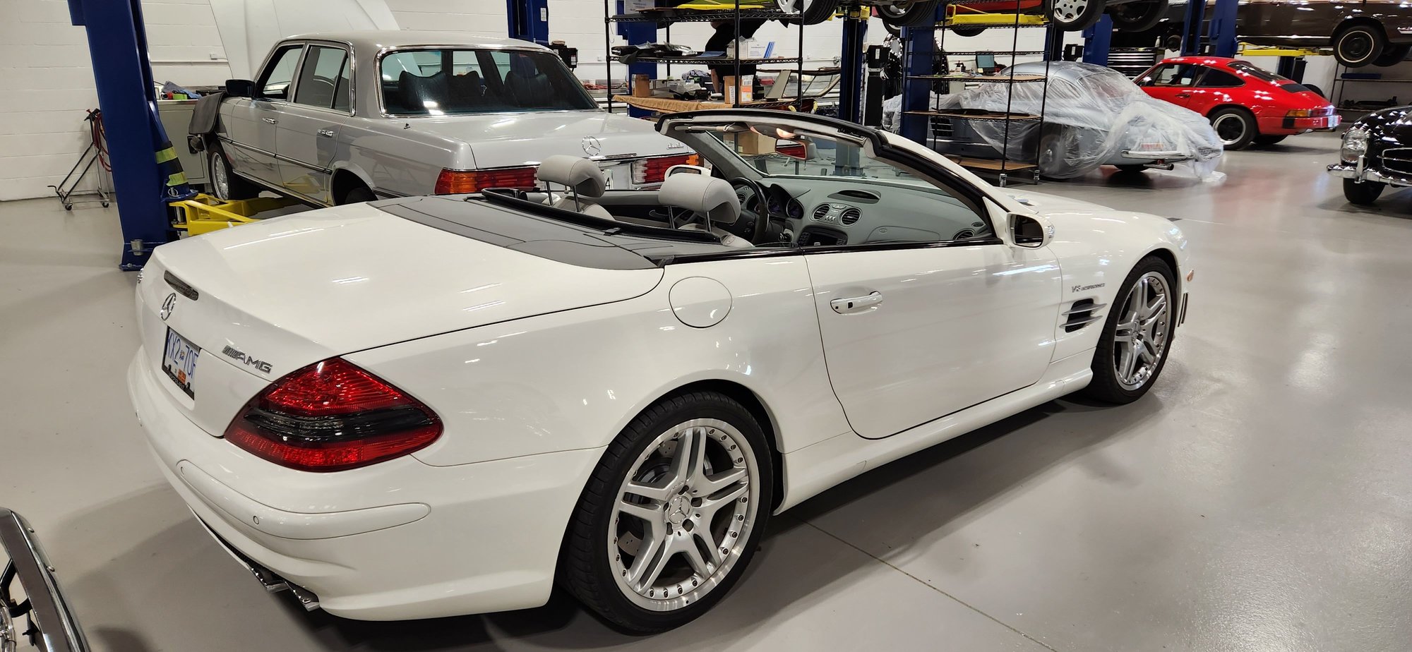 Pano roof down and stored, all hydraulics working as they should. The SL design certainly stands the test of time.
