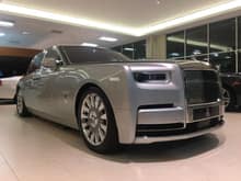 The first ever redesigned 2018 Rolls Royce Phantom has arrived at Rolls Royce & Bentley Sterling in Virginia yesterday.  As you can see, this model has curved headlights and a new lighting graphic that surrounds the outside of the headlamp units. The grille of this car is structured more differently. The interior looks absolutely stunning! It looks very comfortable to sit and relax in. We certainly can't wait to see more of these units on the streets.