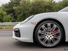 A sweet rolling shot of the white Cayman protected with XPEL STEALTH