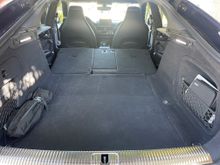 Trunk with rear seats folded, you can sleep in it.