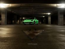 2017 Porsche 911 4s in Signal Green shot in a Parking Garage.