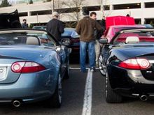 2 Jaguar XK's.