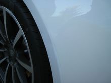 dent and scratches on rear fender