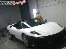 Wrapping Glossy Black Ferrari with Matte White Vinyl 2