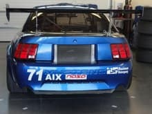 View of the same 850 HP Mustang AIX class car. Note intercooler located in the rear of the car. The turbo is located in the rear for better balance and temperature control.