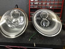 Side by side comparison of the stock Head Light and the Aftermarket with LED running light
