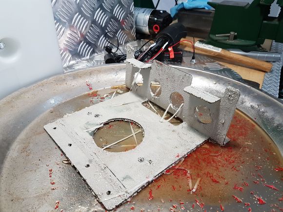 Stripped the paint of the supplied tank braket. Will spray it black