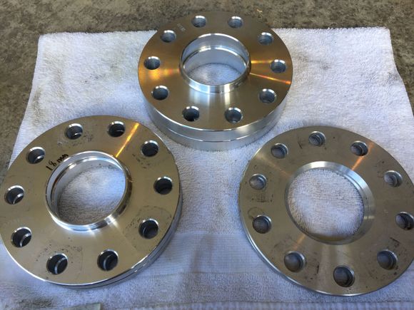 2x 20mm, 18mm, 7mm. Previous car had studs and the 20mms allowed me to use my NB wheels on a WB.