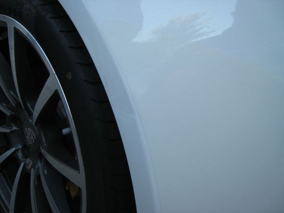 dent and scratches on rear fender