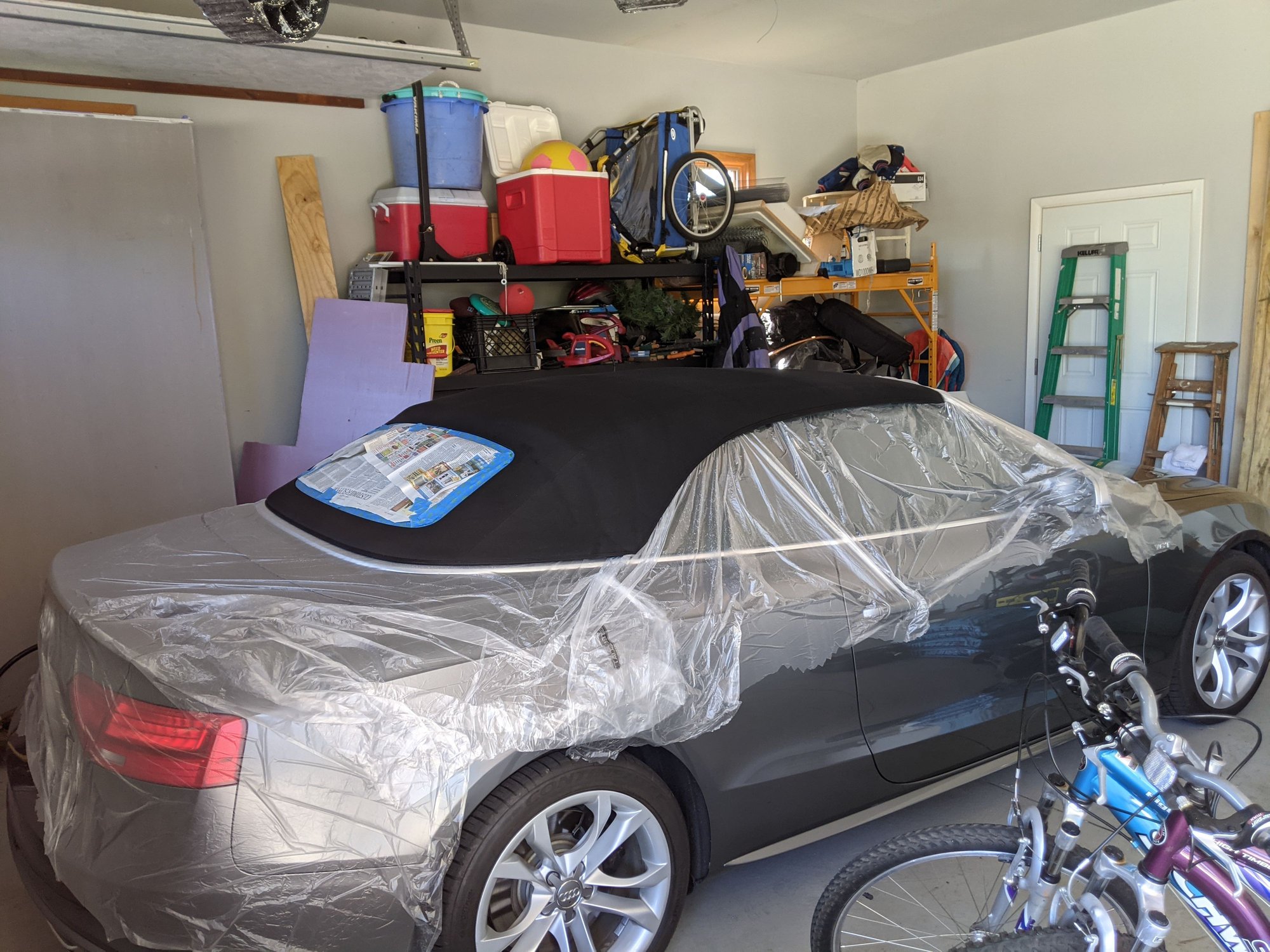 Treating top with Porsche Cabriolet Top Protectant and Waterproofer AudiWorld Forums