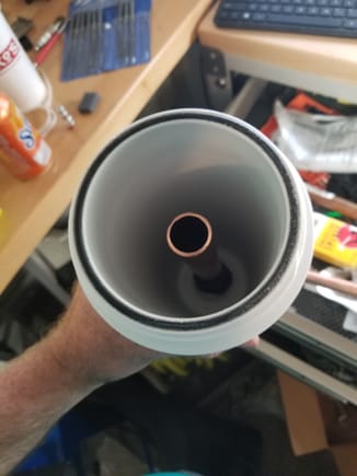 Same pipe epoxied to the bottom of the water filter