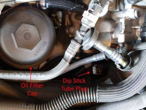 Location of the oil filter housing and the dip stick tube.