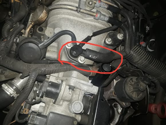Hello,

I've been trying to figure out the name of the part I have circled in red. There's a hole in mines and I would like to replace it. My manual as well as my local auto part stores couldn't help me. 

Does anyone know the name of that part? My vehicle is a 2000 Buick Regal Supercharge.

Thanks in advance.