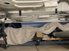 View of the fuel lines and hard brake line goes to the rear looking across from the passenger side prior to the driveshaft loop being installed.