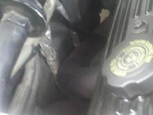 This is proof of why u don't pay lazy people to work on your car!!! If u look close, u will see 2 wiring bundles from the harness, and they're both wrapped in heat tape, but they're both pinned between the panel and the header tubes!!!!! I don't think anybody with a brain would leave it like that, so my plan? Time to inspect the wires, fix, extend and reroute. Oh did I mention that some of those wire go straight to the computer?????