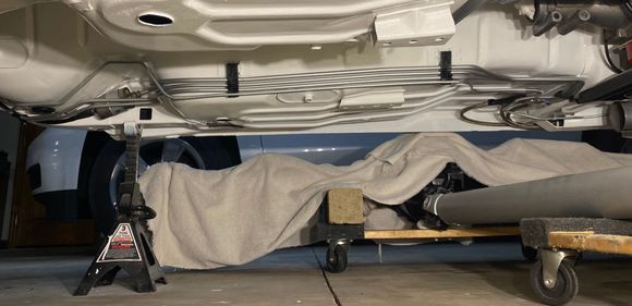 View of the fuel lines and hard brake line goes to the rear looking across from the passenger side prior to the driveshaft loop being installed.