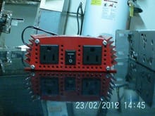 This is the voltage inverter that converts 12 volts DC to 110 volts AC, to power the Yaquin vacuum tube 'sound enhancer'/gain amplifier.  It's quiet in operation (it has a cooling fan), doesn't produce any nasty noises in the Yaquin, and is efficient. It's connected directly to the Optima Red top stereo battery, and is connected, through a relay, to the 'power antenna' lead on the head unit, so the inverter is turned on/off with the rest of the system.