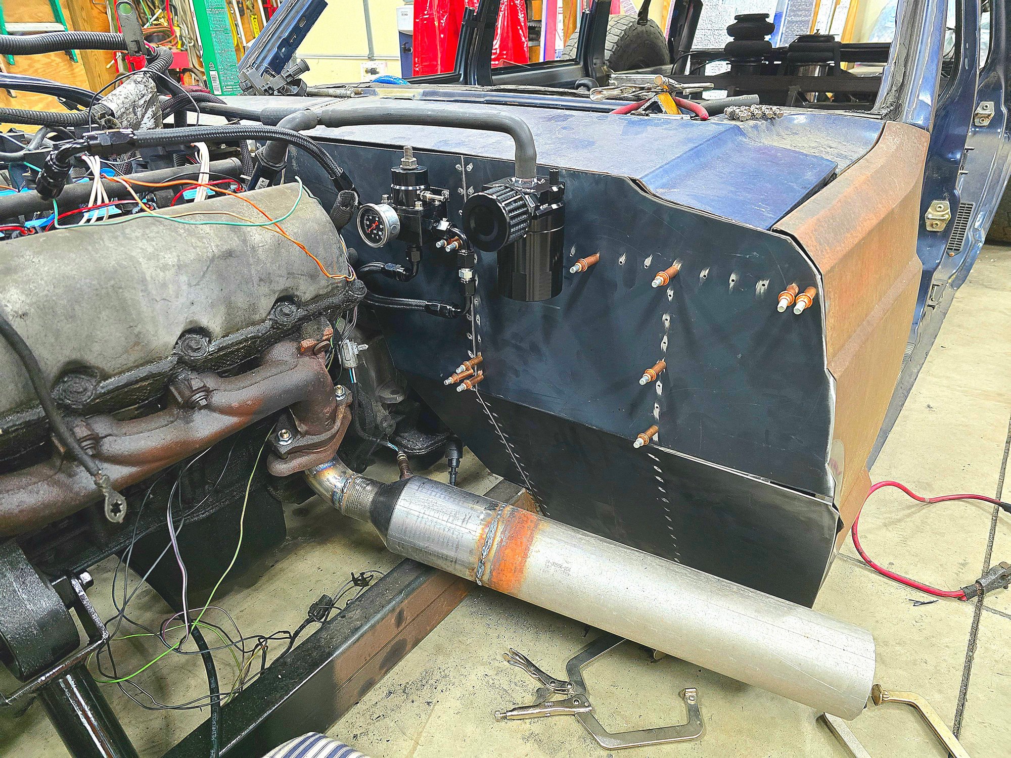 Getting the firewall made and mounting the fuel pressure regulator and oil catch can.