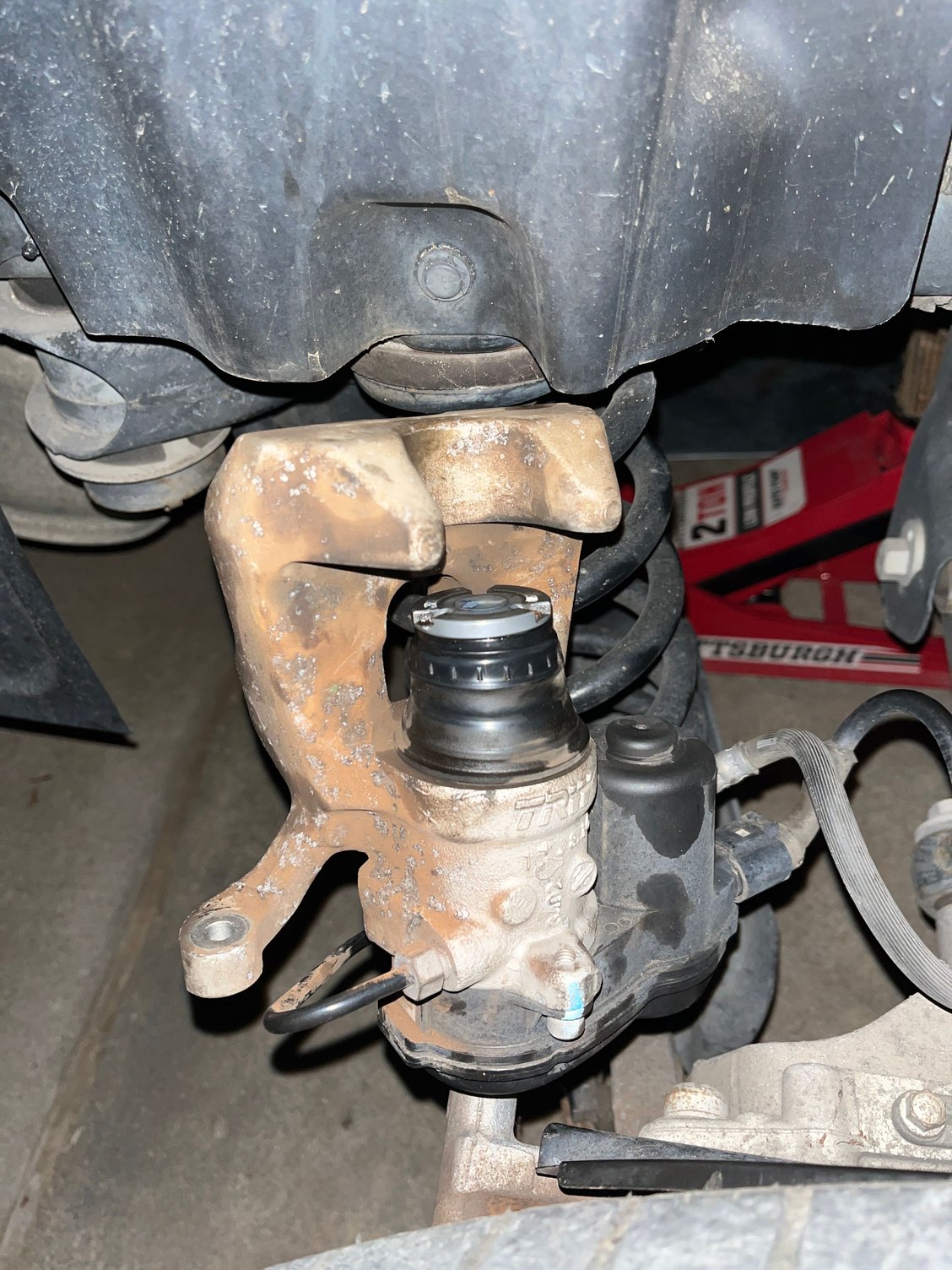 Passenger side I hope to save.  Piston is fully extended and can�t find out how to retract the parking brake.