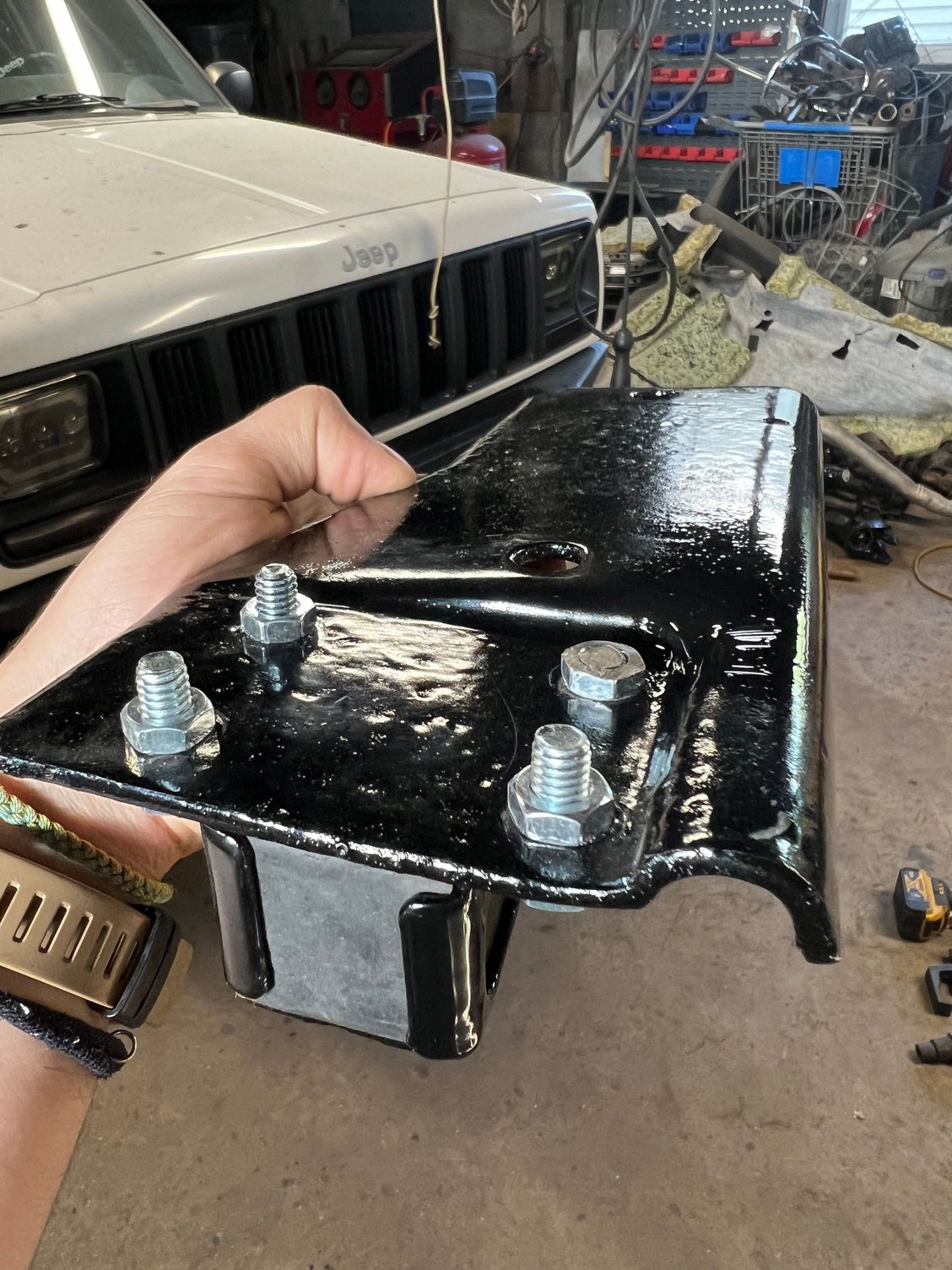 I had to cut one of the bolts short to clear the bottom of the transmission 