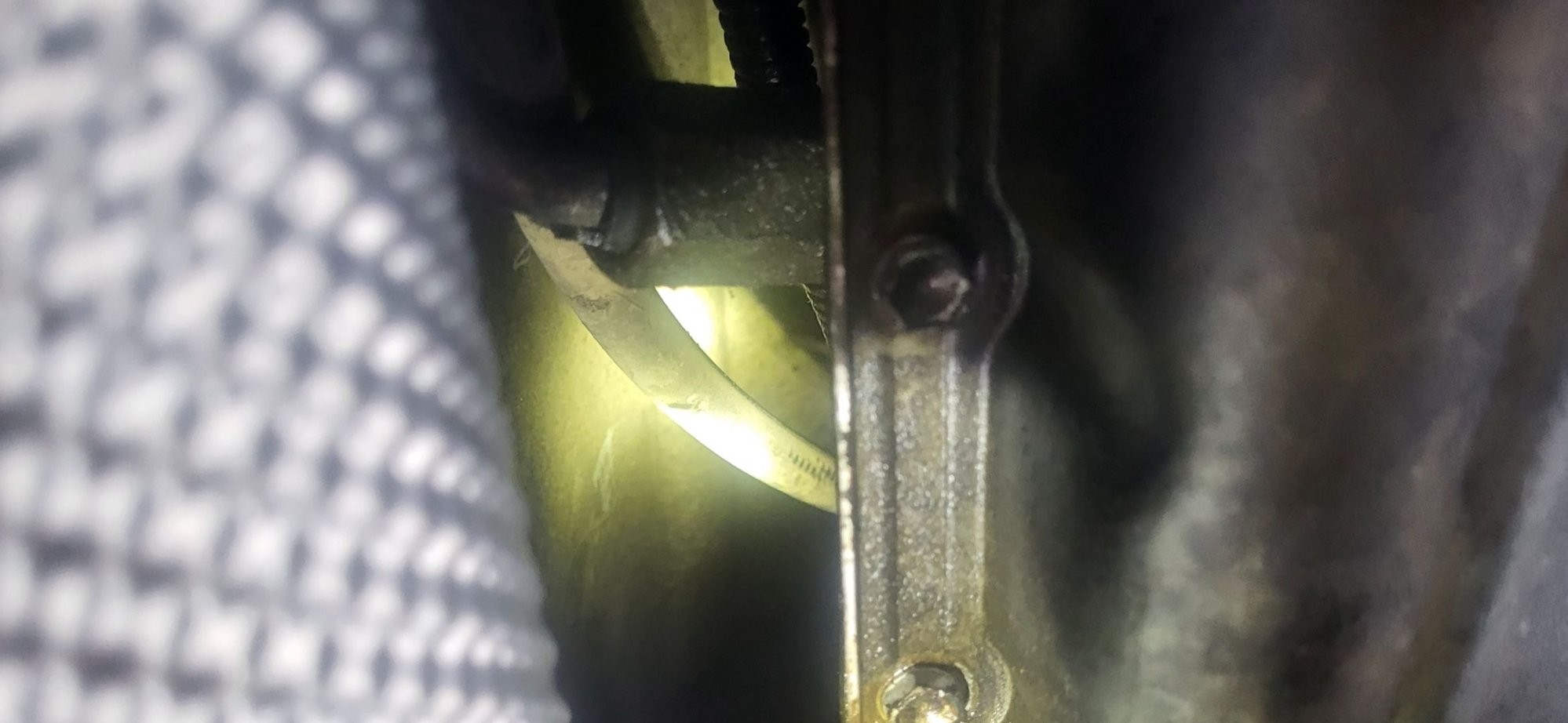 Loops over Tranny to the drivers side. 
