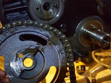 REPLACE THE TIMING CHAINS!!! THATS WHAT CAUSED THIS PROBLEM! TENSIONER WAS IN PEICES AND CHAIN HAD TO MUCH SLACK ..SKIPPED A COG AND BAM! COVER  HAD SOME CHAIN MARKS BUT NOTHING MAJOR...