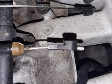 Ill have to shave down a little bit of the plastic so its not resting on top of the fuel rail at idle.