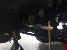 After bolting it all back up, I found the correct tap and cut new threads for it to bolt up to.
