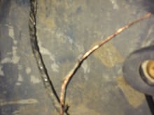 This is right behind the drivers seat..melted wire running under the center console.