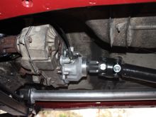 Slip yoke eliminator kit, new shift selector plate, 4WD linkage fabrication, shortened driveshaft, correct speedo calibration set up all done by M.I.T in El Cajon. I added 2 degree shims for the correct pinion angle and all is good!