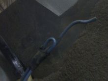 This is located under the steering wheel. If I recall correctly from when I parted out my 97 XJ, this wire is for towing?