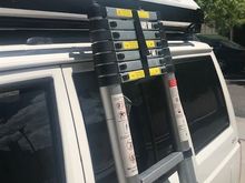 The ladder can be locked in this position or extended.