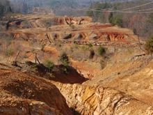 Heavy erosion on top.