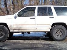 lifted 2&quot; front and rear and 31x10.5 Dunlop mud rovers.