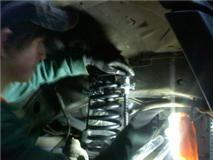 taking off the spring compressor