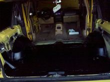 Bed lined the floor and started swapping in a black and tan interior from our wrecked black one