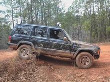 98 Cherokee sport on a 4wheeler trail in Georgia