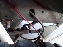 could see daylight through that bushing. spliced brake line zip-tied to the breather? nice!