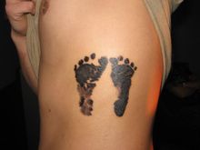my sons footprints tatted on me